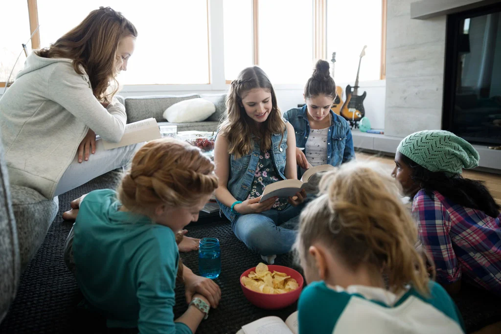 Ayesha Malik with students